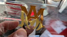 Load image into Gallery viewer, Gold 'NY' logo on a clear background